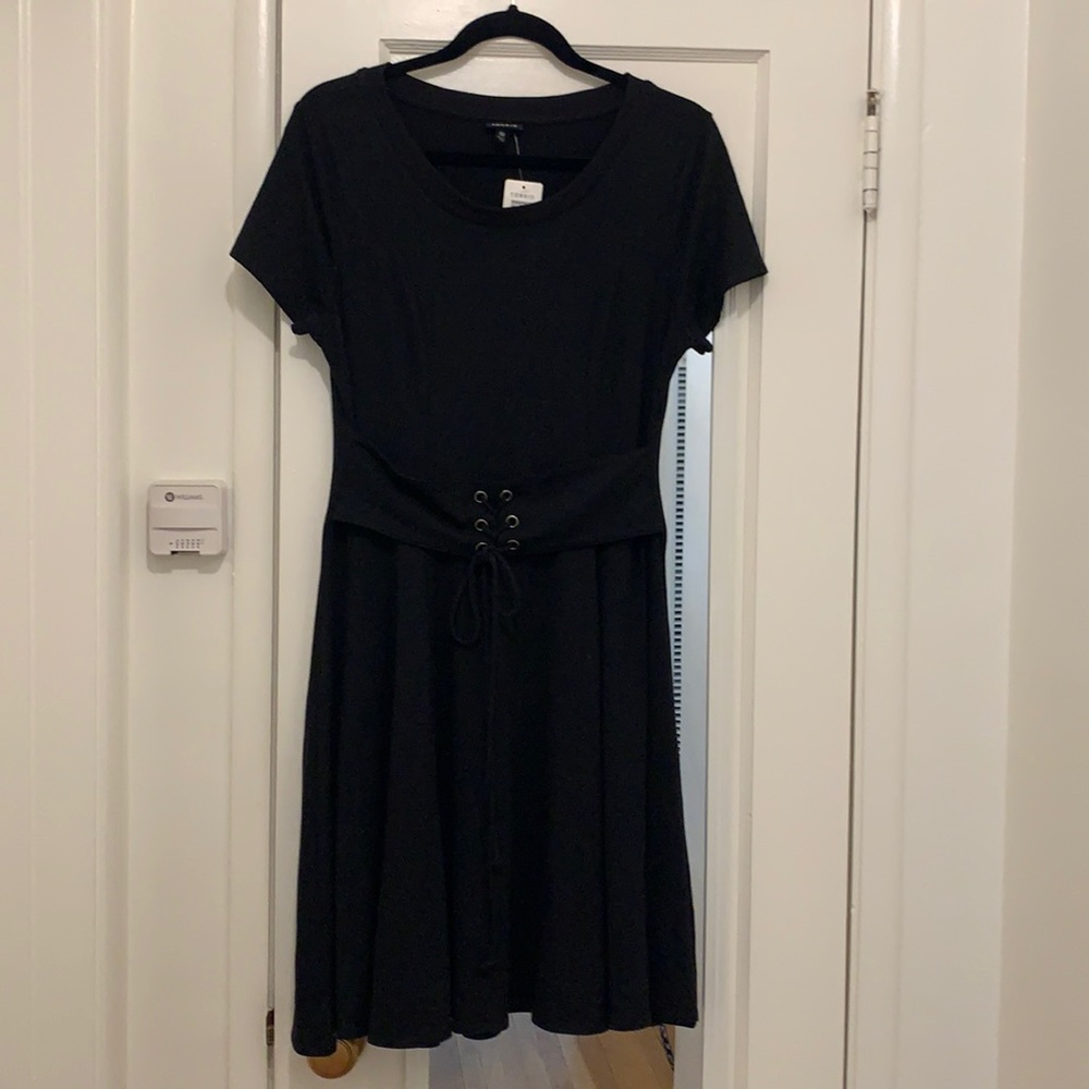 TORRID Size 00, M/L, 10. Black Shory Sleeve Lace-Up Corset corset T-shirt Dress.